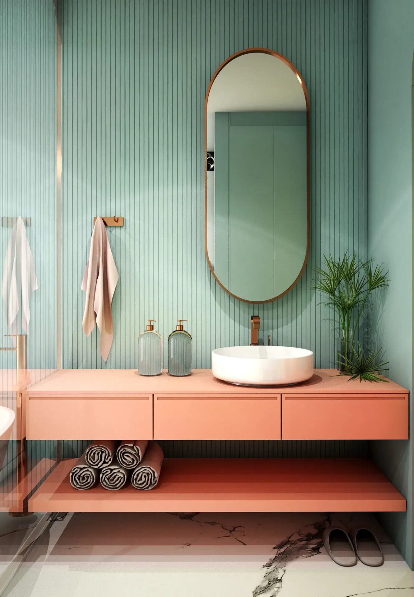 Green bathroom with coral vanity and oval mirror